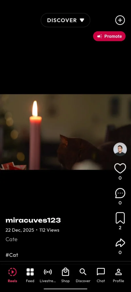 Mobile vertical-video feed with creator details, caption, engagement actions, discovery mode, and content navigation
