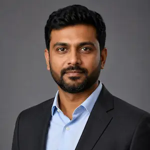 Professional portrait of Arjun Reddy, Co-founder and CTO of Odient Technologies Pvt. Ltd., featured in a testimonial about building a field-service management platform.